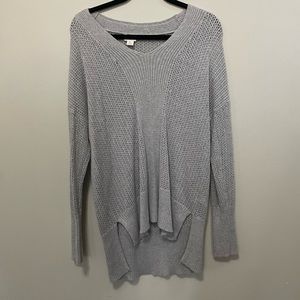 Long sleeved, see through sweater.